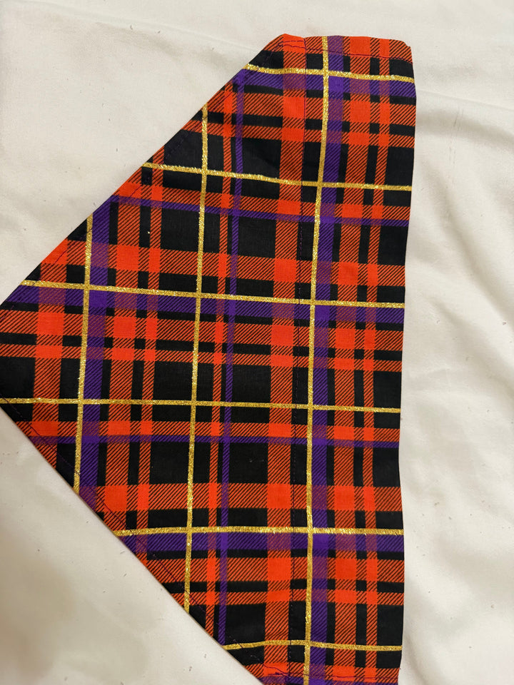 Halloween plaid pet bandanna in black, red, purple, and gold tartan